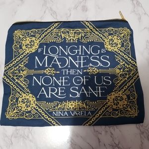 Crier's War, if longing is madness, makeup bag